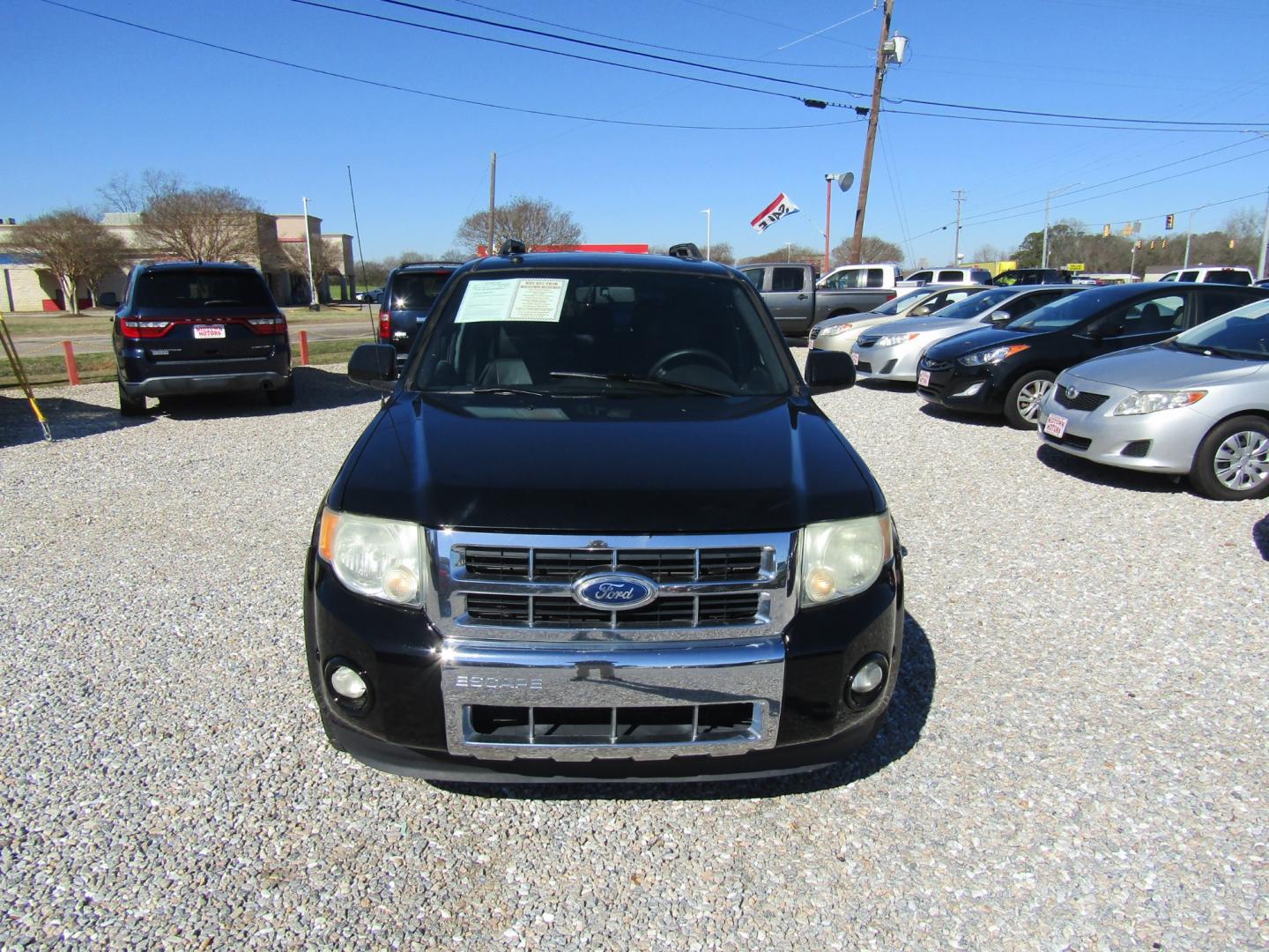 2010 Black Ford Escape Limited FWD (1FMCU0EG8AK) with an 3.0L V6 DOHC 24V engine, Automatic transmission, located at 15016 S Hwy 231, Midland City, AL, 36350, (334) 983-3001, 31.306210, -85.495277 - Photo#1